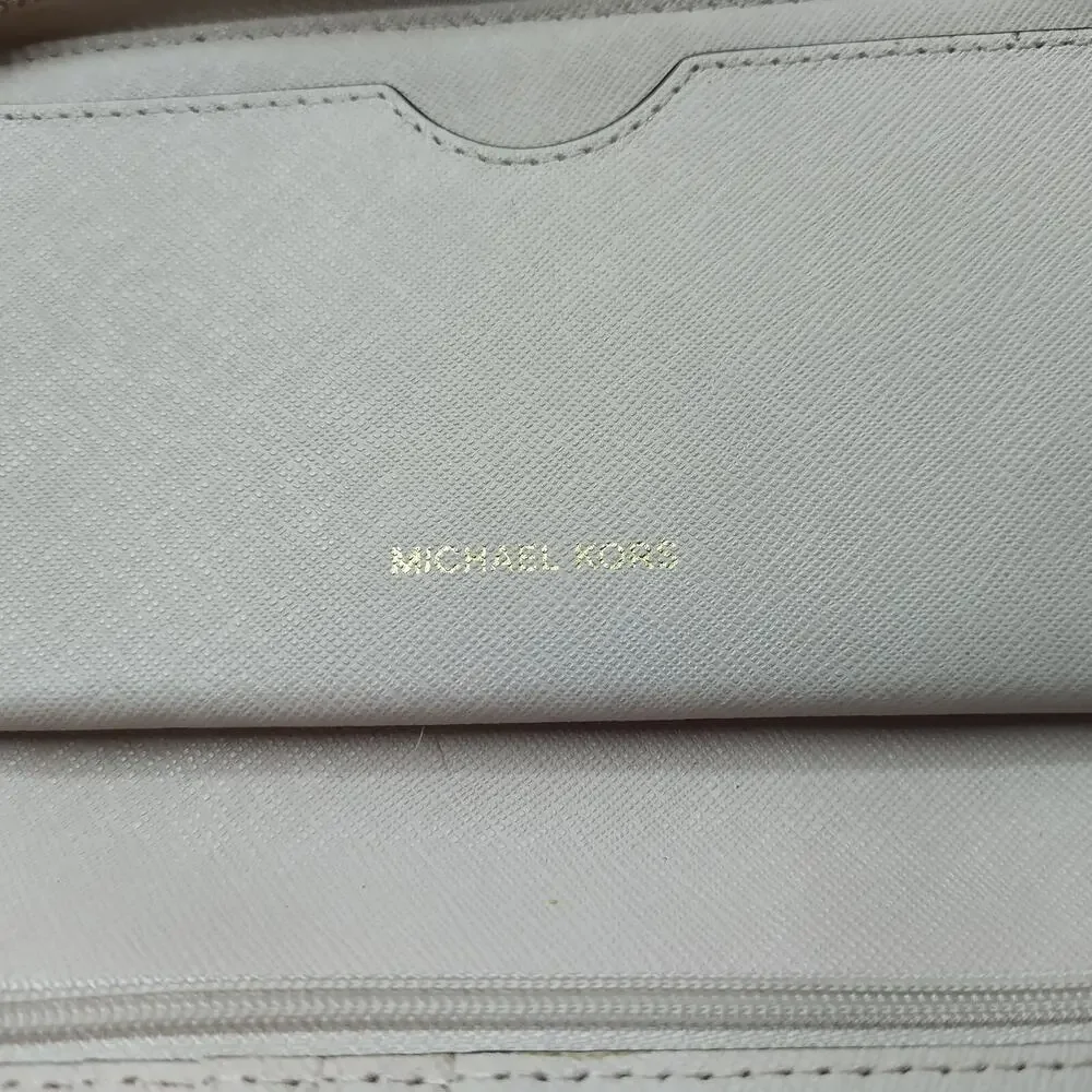 Michael Kors Light Pink Pebbled Leather Zip Around Credit Card ID Window Wallet